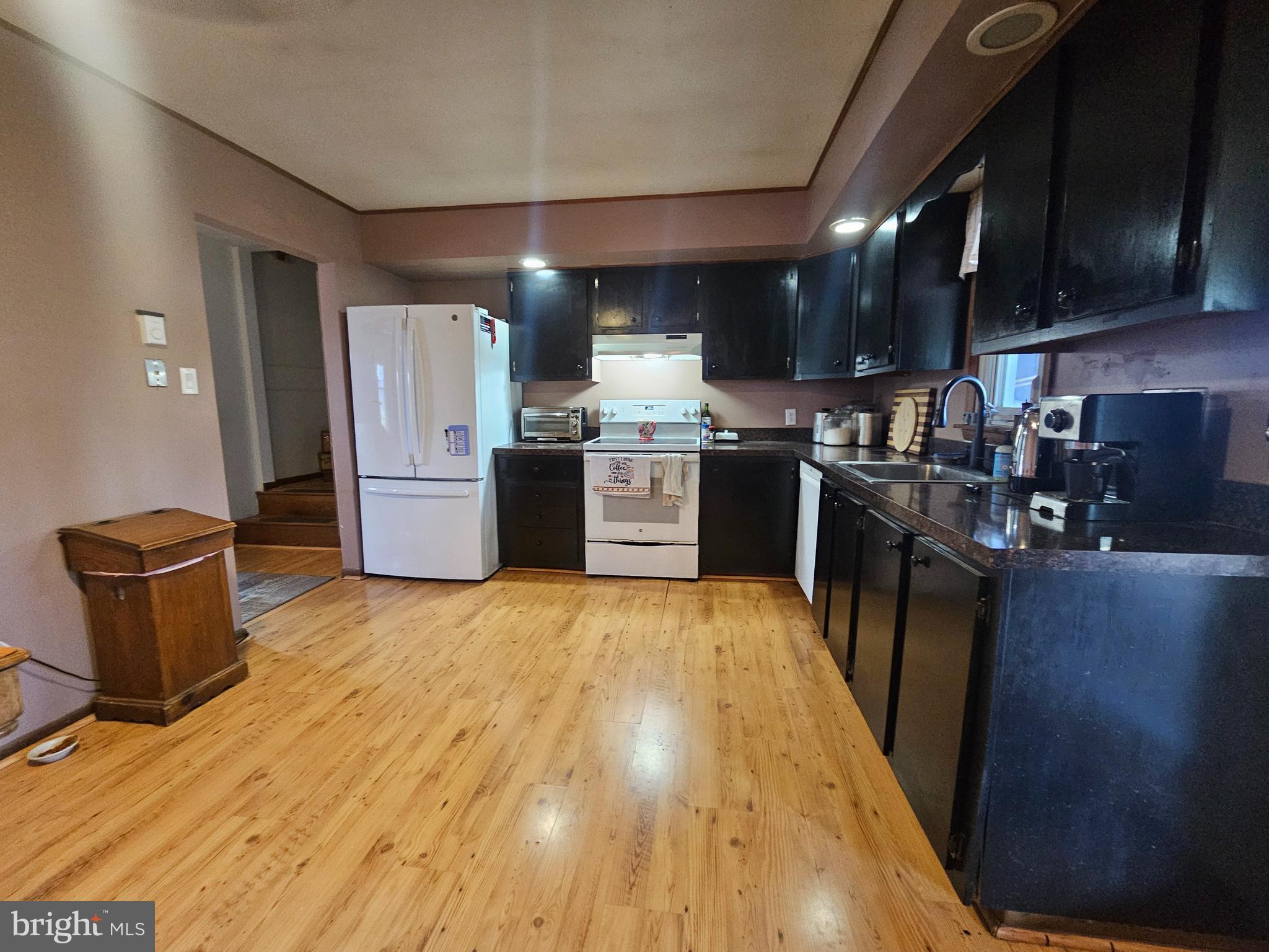 2733 Bachman Road Westminster, MD 21157 - Photo 8 of 43 a kitchen with stainless steel appliances granite countertop a refrigerator a stove top oven a sink and dishwasher