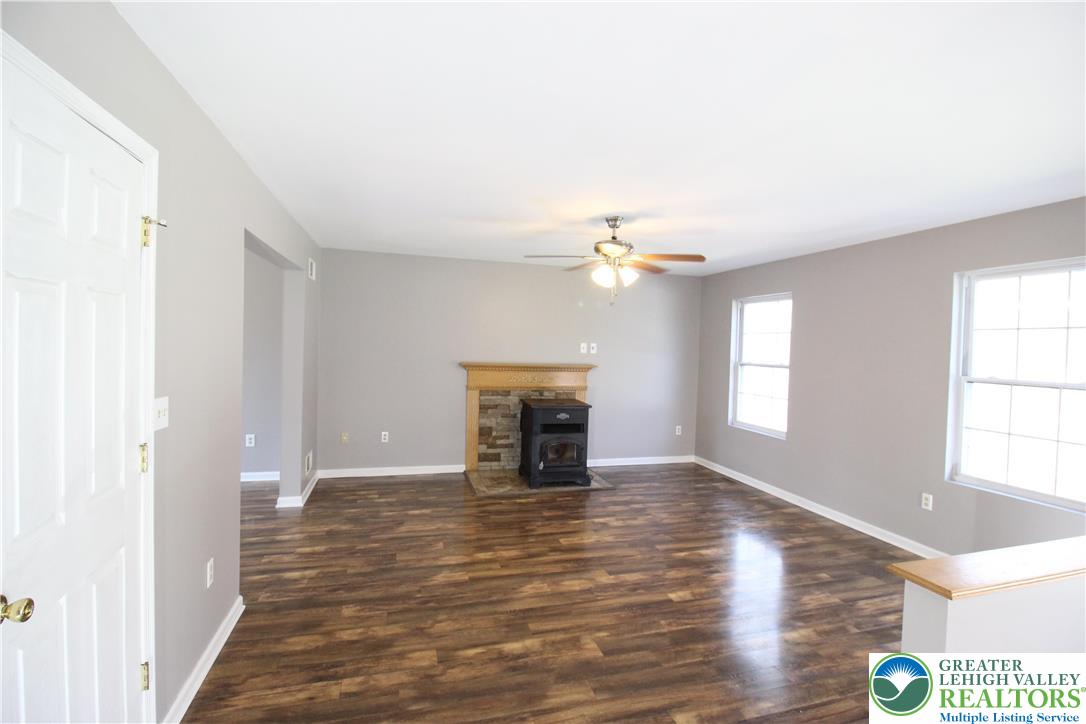 312 Old Grade Road Wind Gap, PA 18091 - Photo 8 of 54 a view of an empty room with window and wooden floor