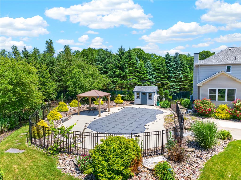220 Pennbrook Road Stroudsburg, PA 18360 - Photo 6 of 60 A private backyard oasis features a fenced-in pool with a gazebo, perfect for outdoor leisure.