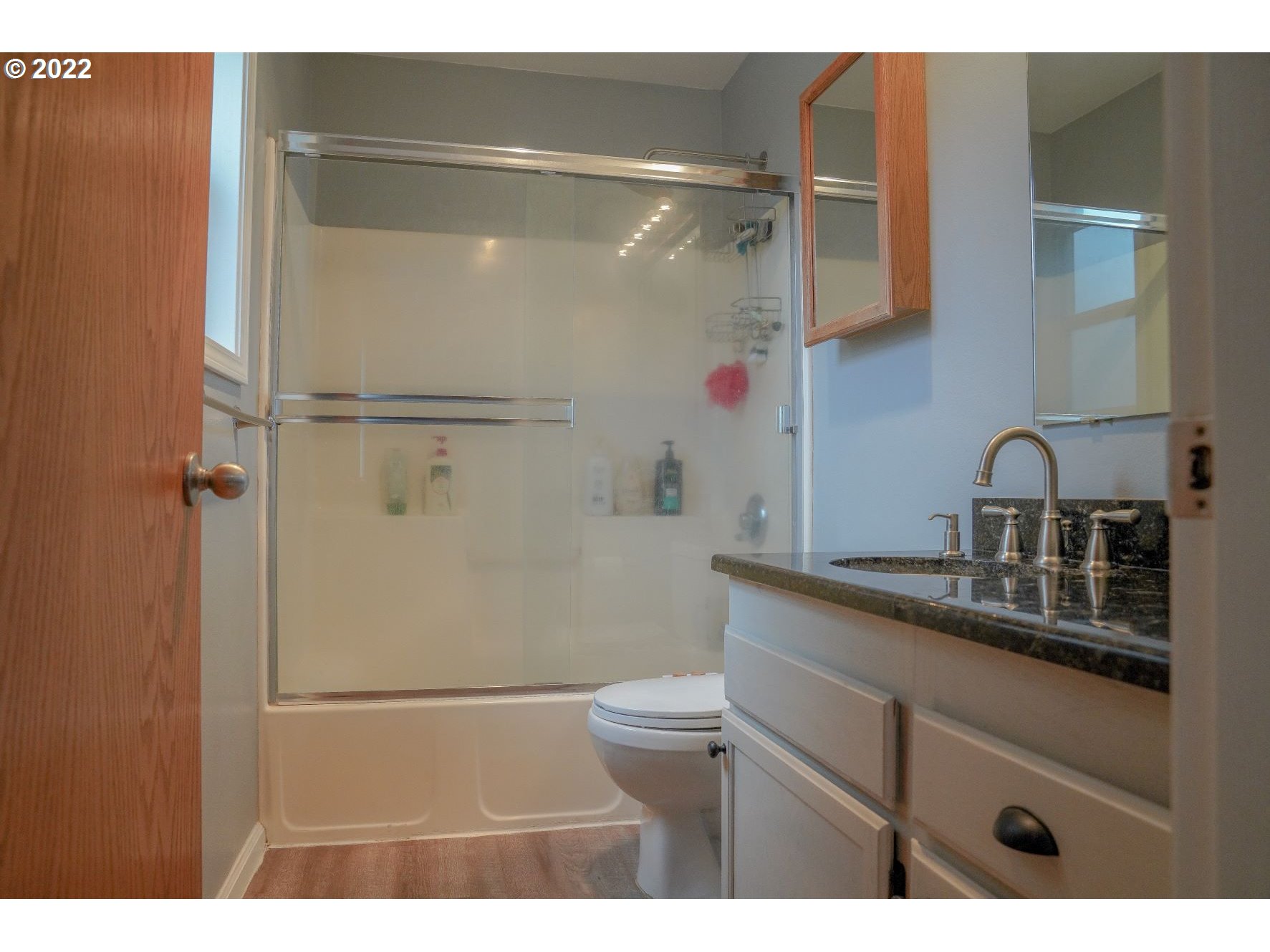 560 South 70th Street Springfield, OR 97478 - Photo 12 of 21 a bathroom with a sink a toilet and shower
