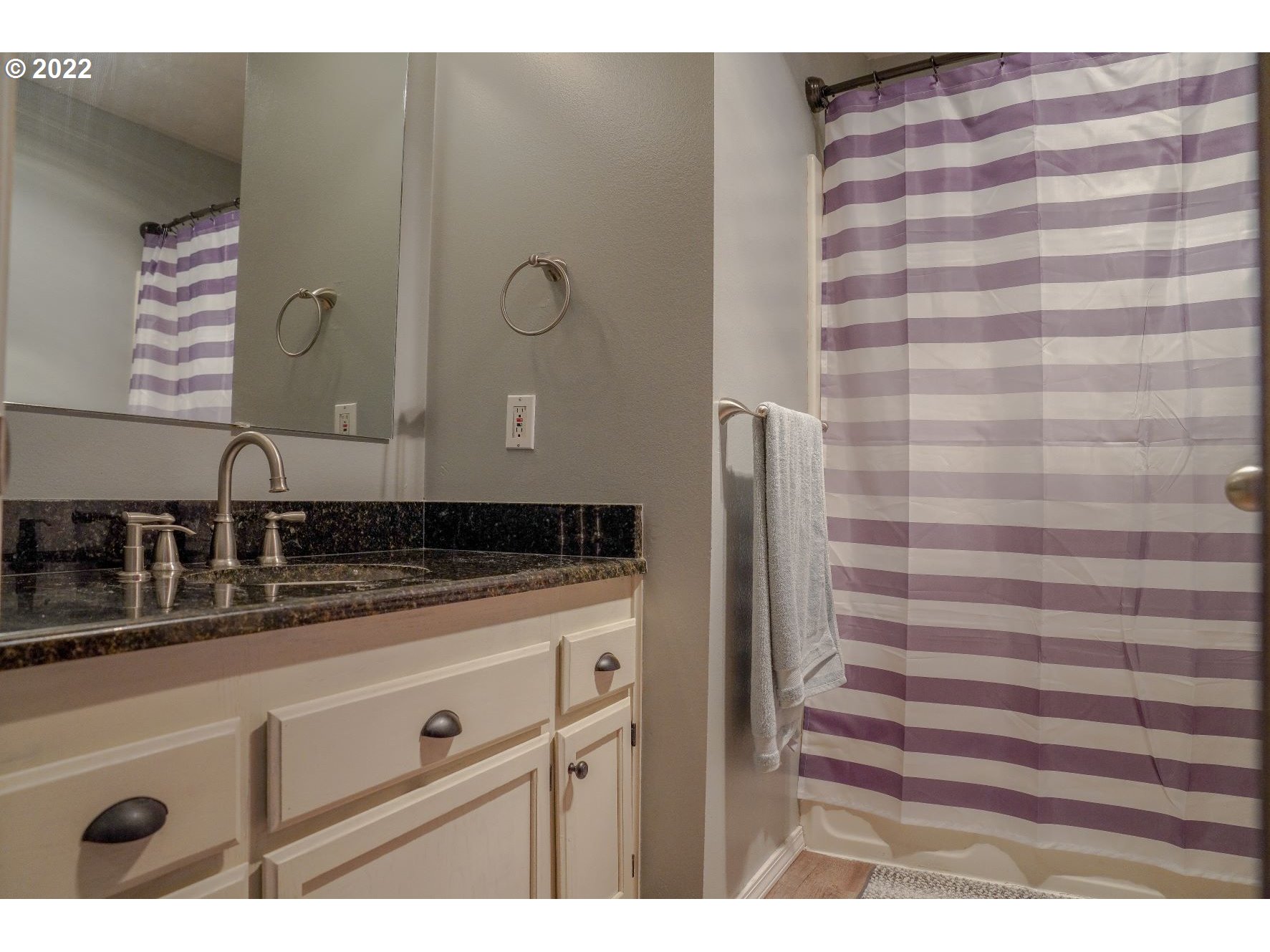560 South 70th Street Springfield, OR 97478 - Photo 14 of 21 a bathroom with a sink and a mirror