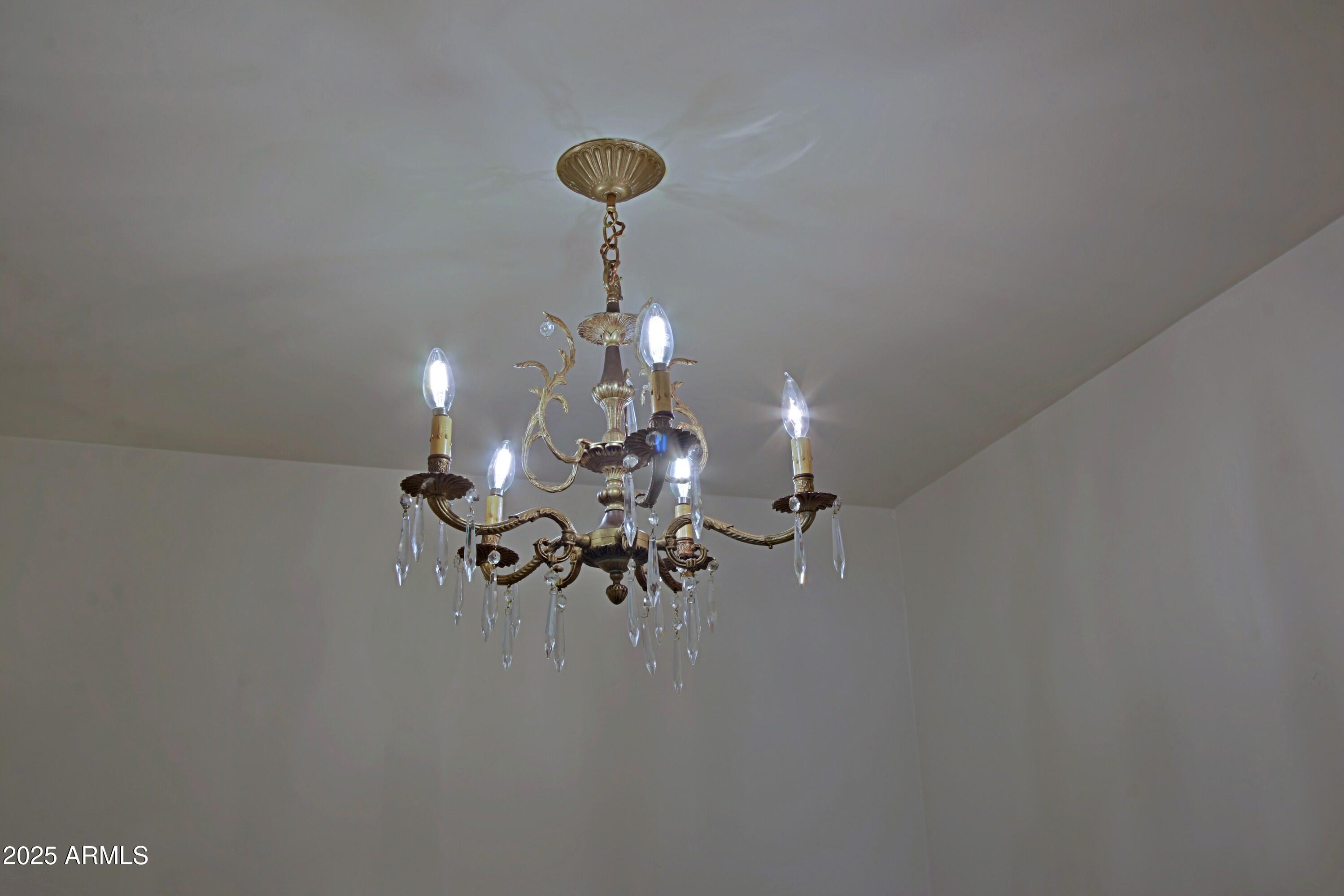 190 East Coronado Road, Unit 73 Phoenix, AZ 85004 - Photo 23 of 56 Primary bath chandelier