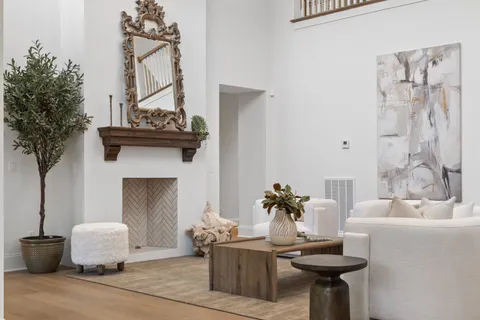a bathroom with a granite countertop sink a toilet and shower