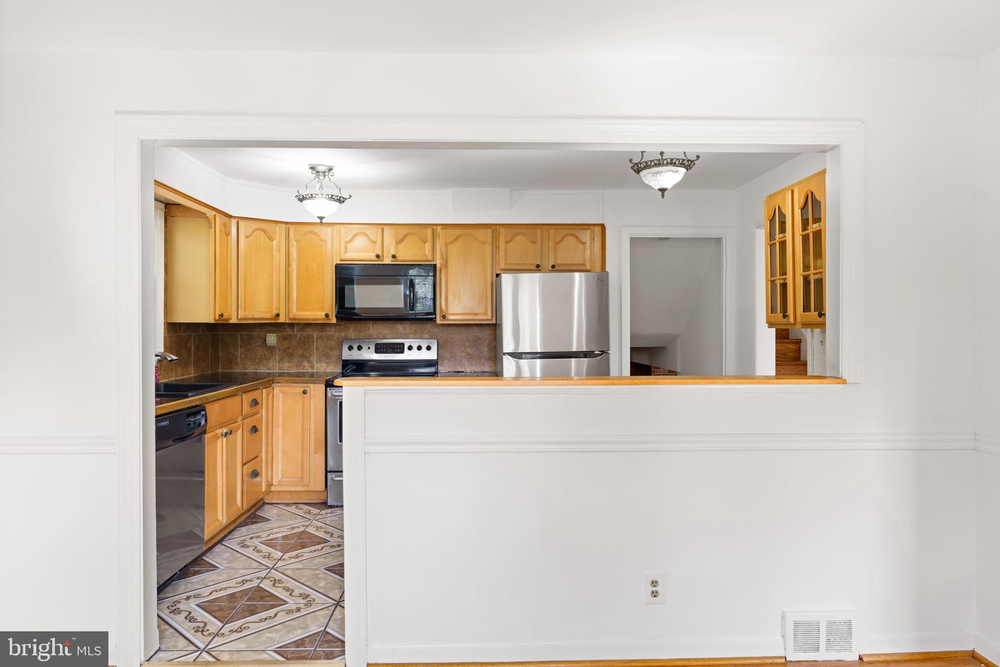931 Jones Road Conshohocken, PA 19428 - Photo 21 of 66 View from Dining Room to Kitchen