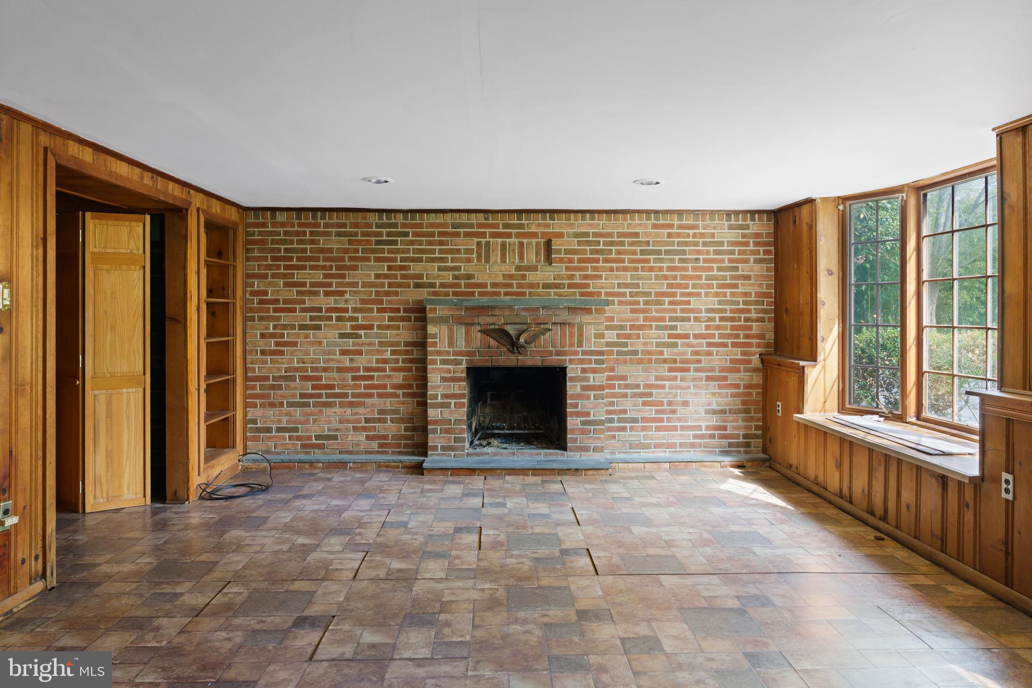 931 Jones Road Conshohocken, PA 19428 - Photo 25 of 66 Family Room-Wood Fireplace