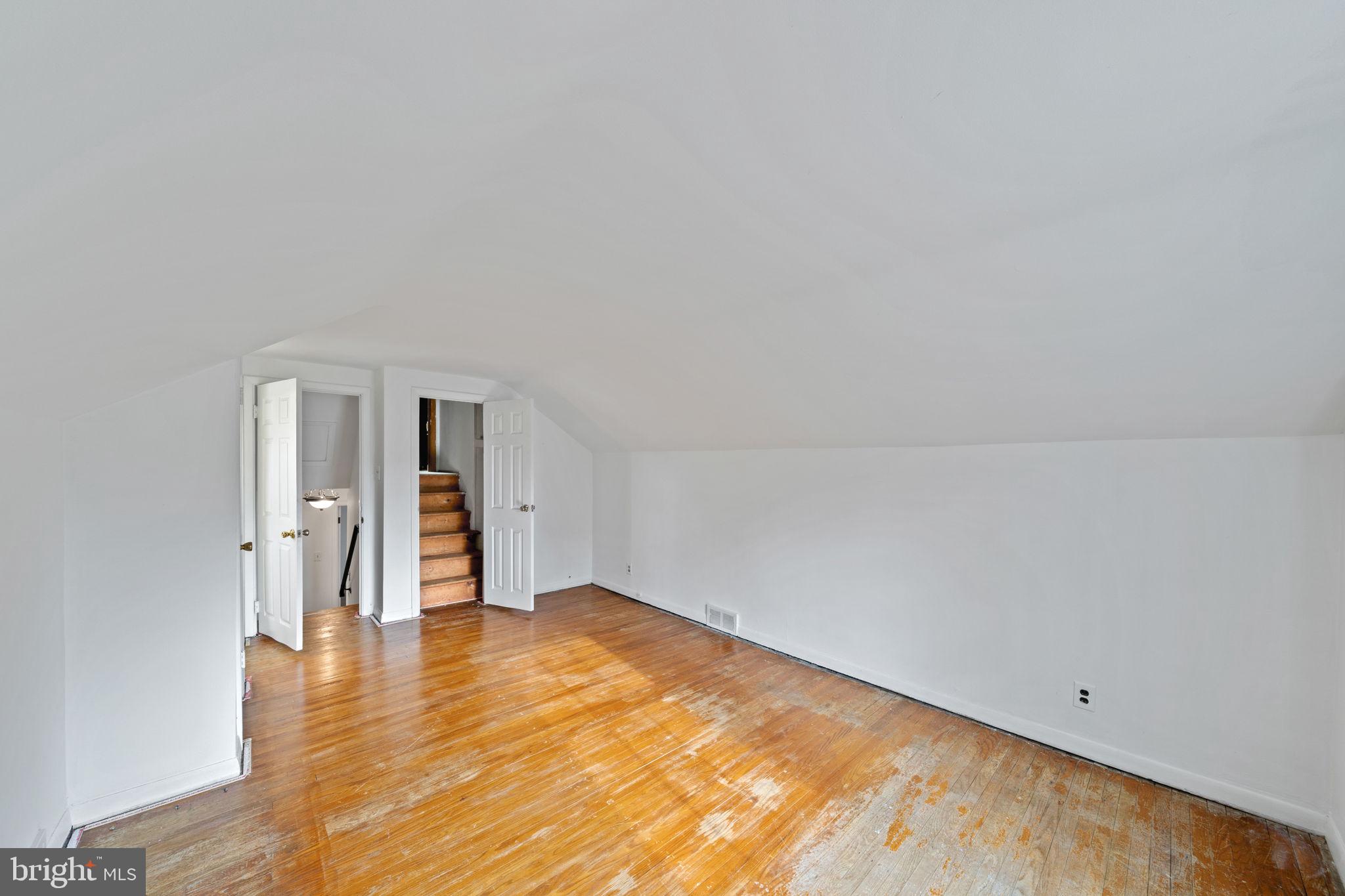 931 Jones Road Conshohocken, PA 19428 - Photo 36 of 66 Primary Bedroom with view to Attic Door