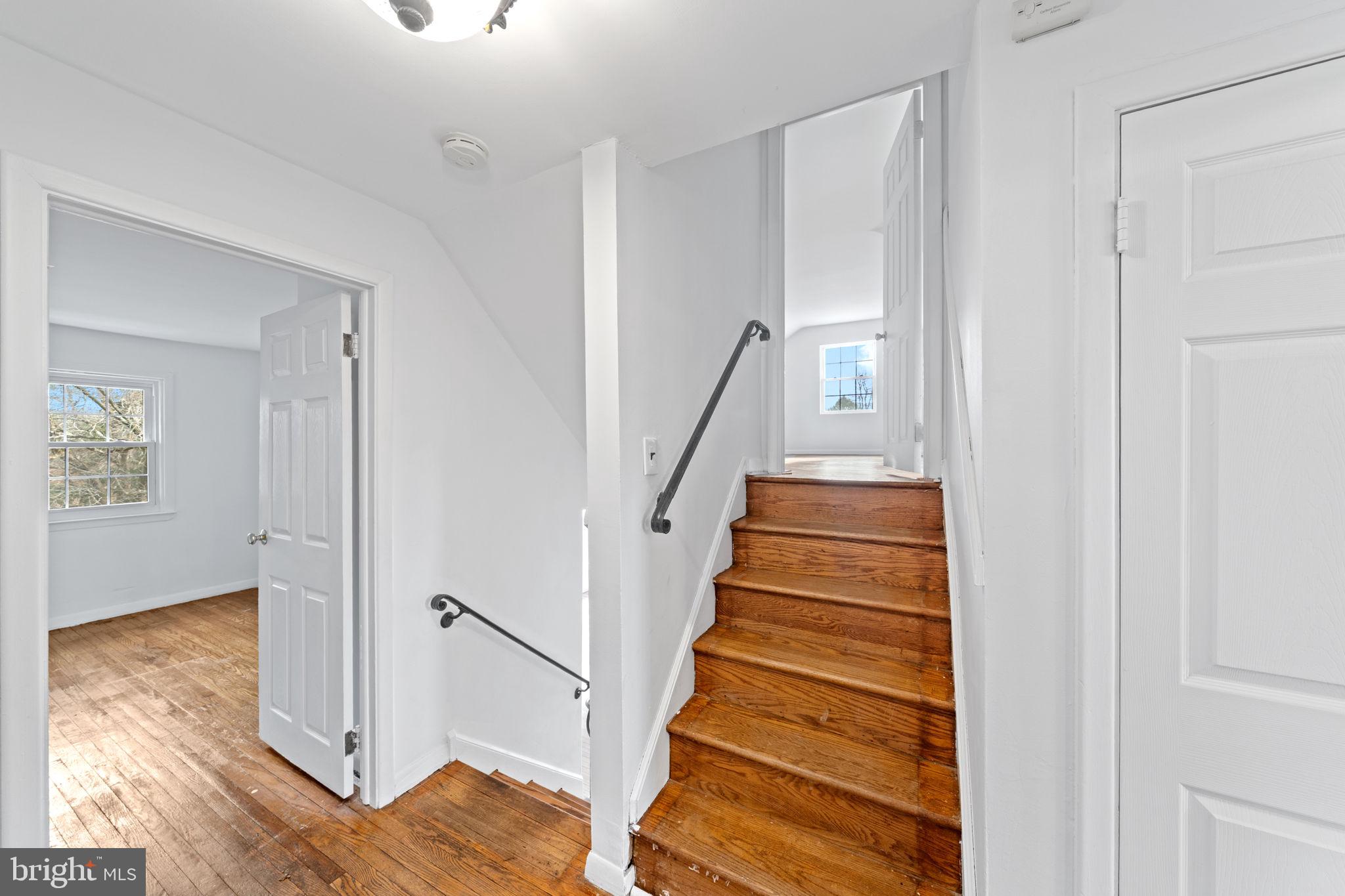 931 Jones Road Conshohocken, PA 19428 - Photo 41 of 66 Steps from Hall to Primary Bedroom