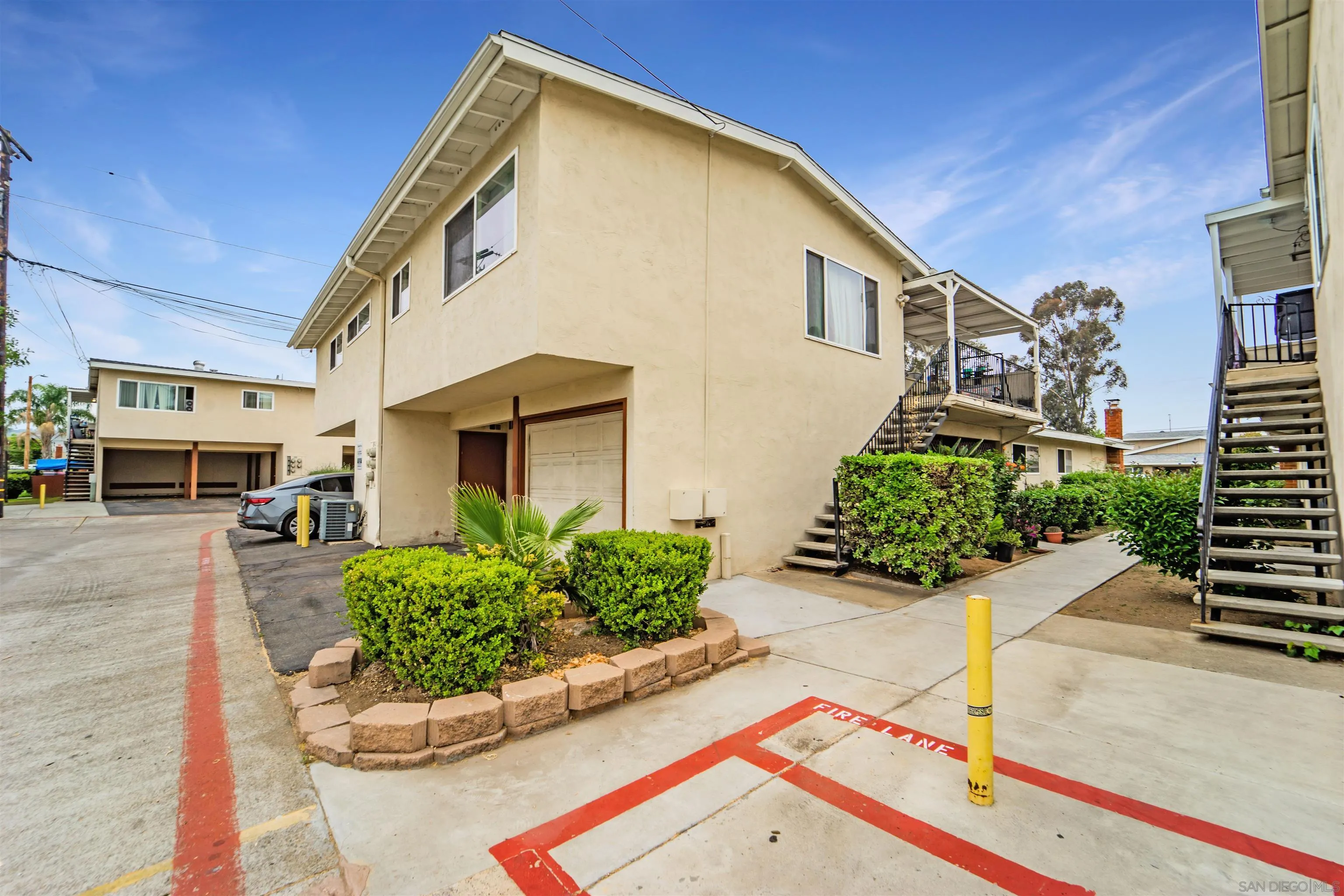 399 Compton Street El Cajon, CA 92020 - Photo 11 of 14 a front view of a house with a yard