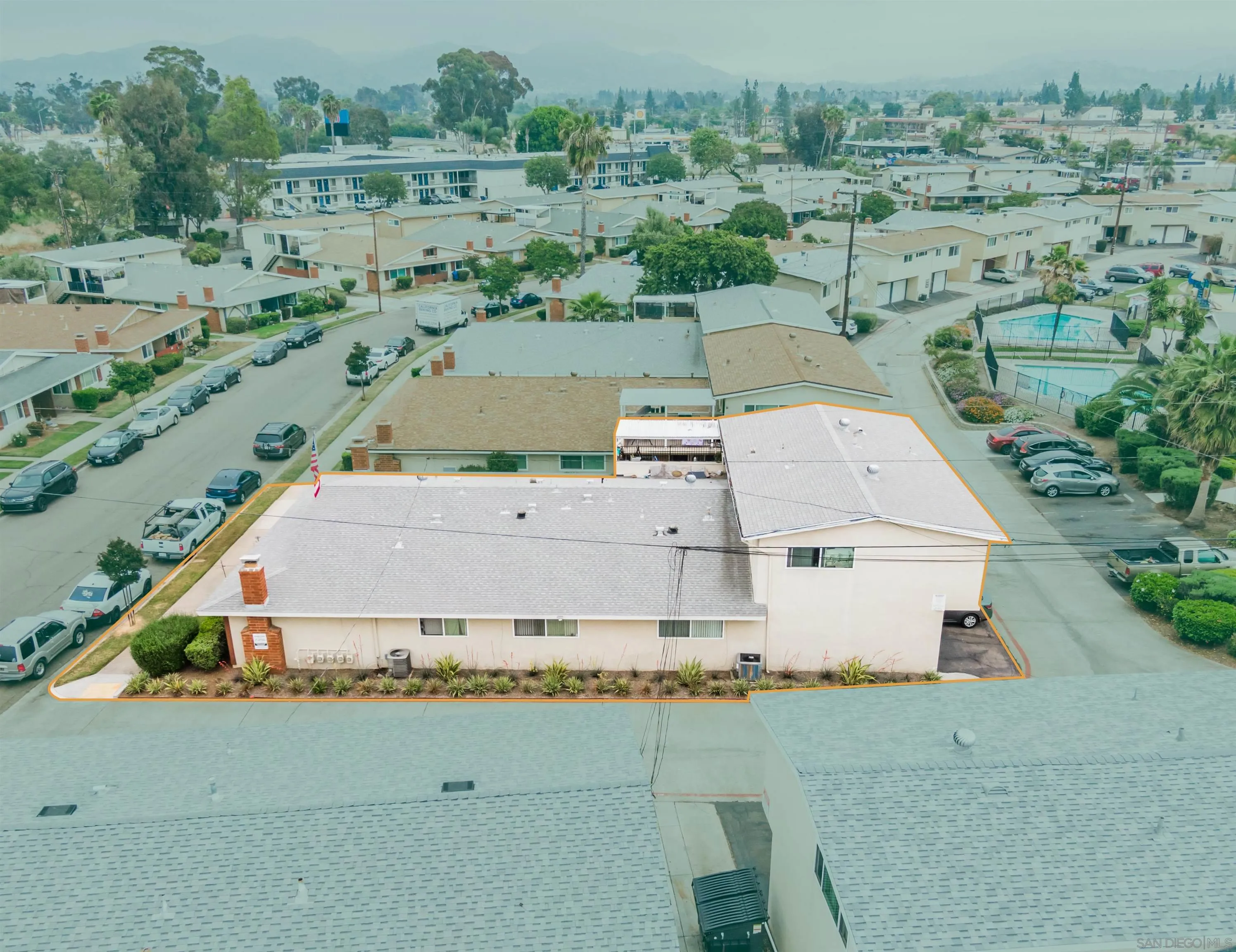 399 Compton Street El Cajon, CA 92020 - Photo 2 of 14 an aerial view of a house with a yard