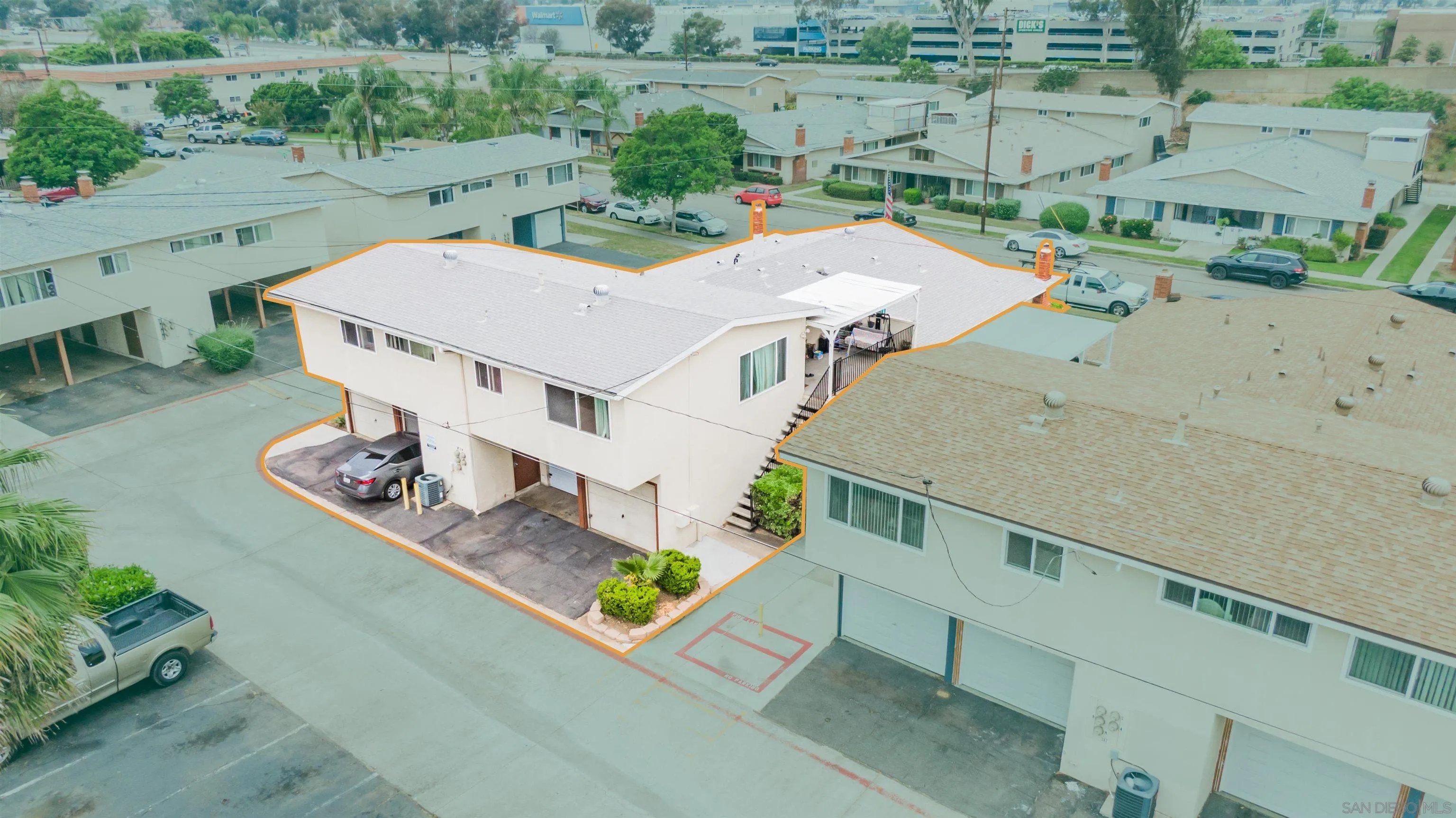 399 Compton Street El Cajon, CA 92020 - Photo 3 of 14 an aerial view of a house with a garden