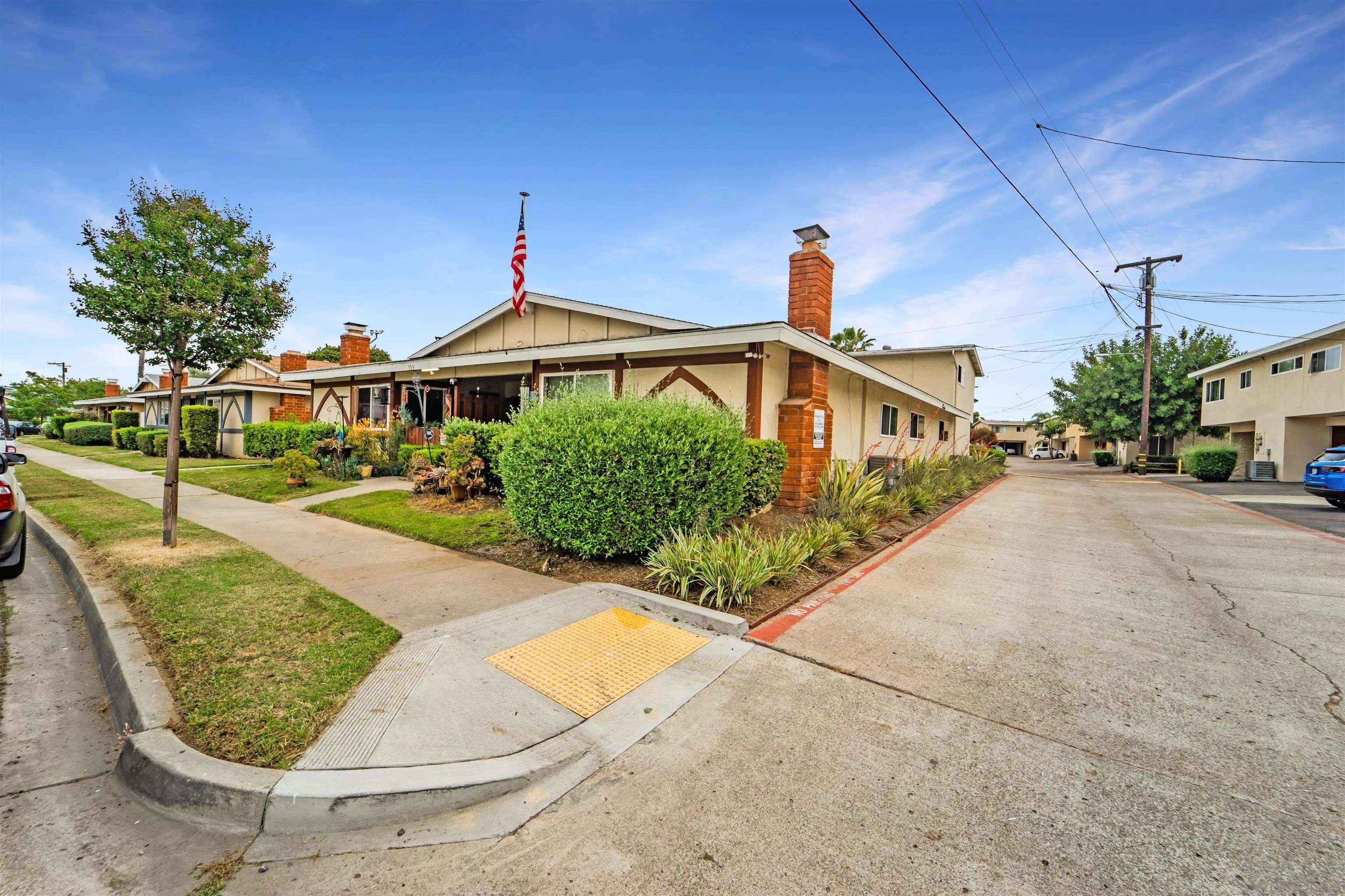 399 Compton Street El Cajon, CA 92020 - Photo 7 of 14 a front view of a house with yard