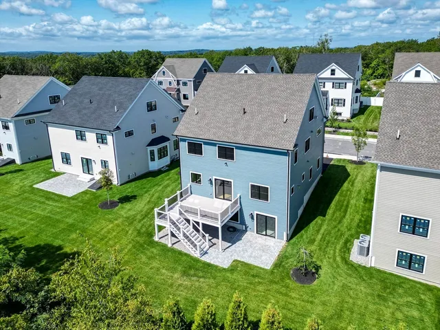 an aerial view of a house with a garden