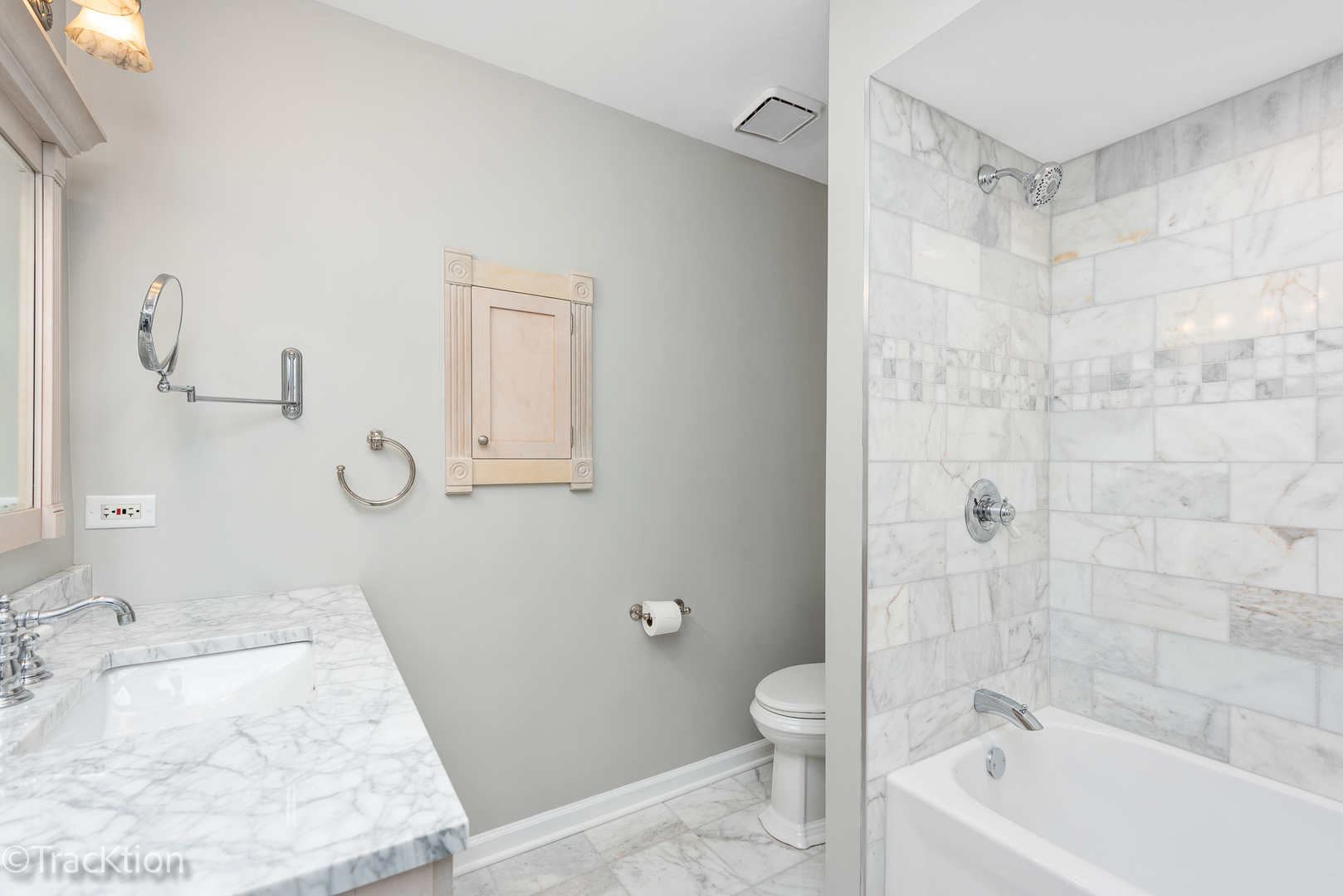 1212 Gartner Road Naperville, IL 60540 - Photo 21 of 32 a bathroom with a bathtub sink and toilet