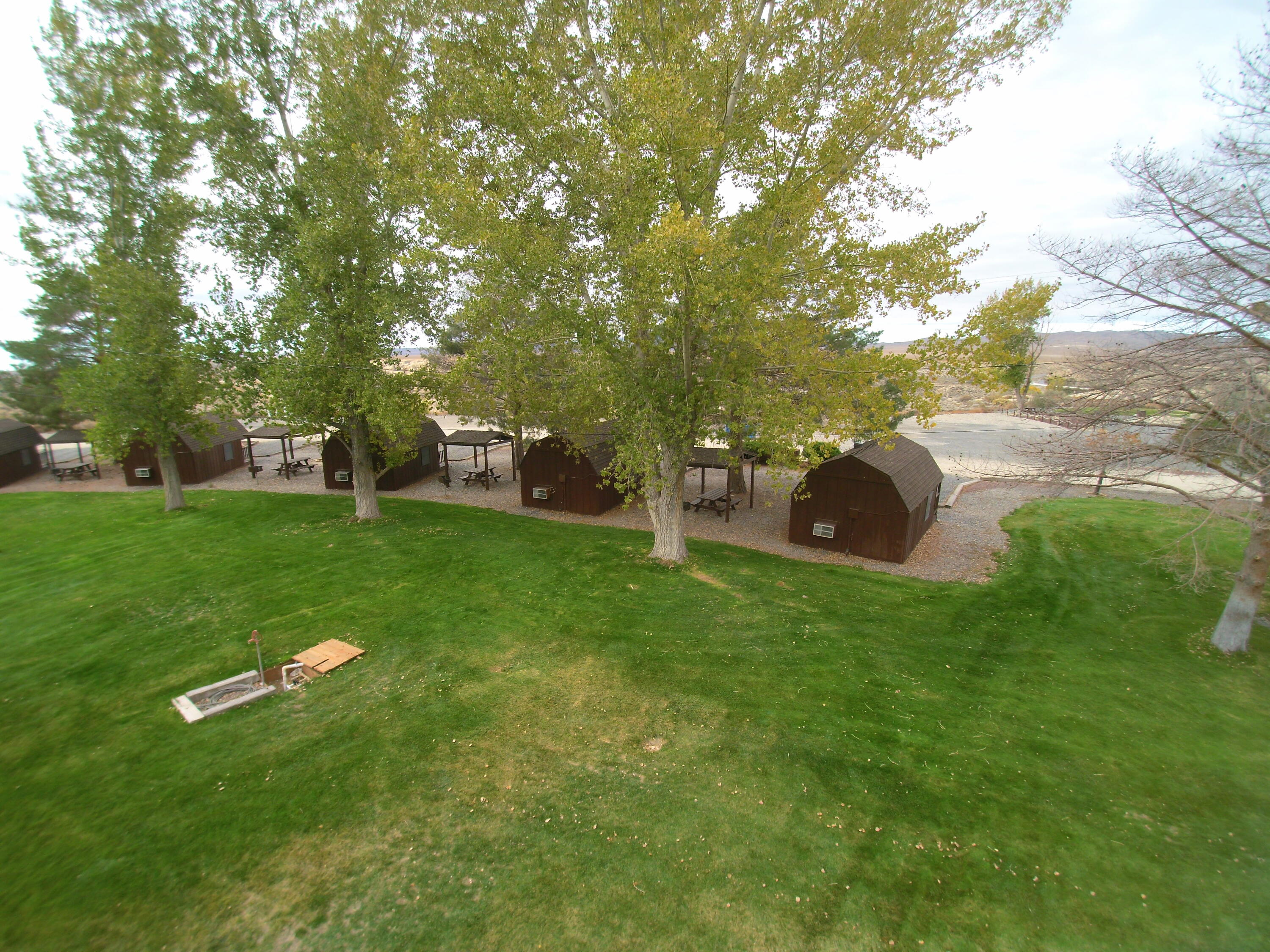 25200 Ramsey Road, Unit 37 Imlay, NV 89418 - Photo 14 of 19 a backyard of a house with table and chairs