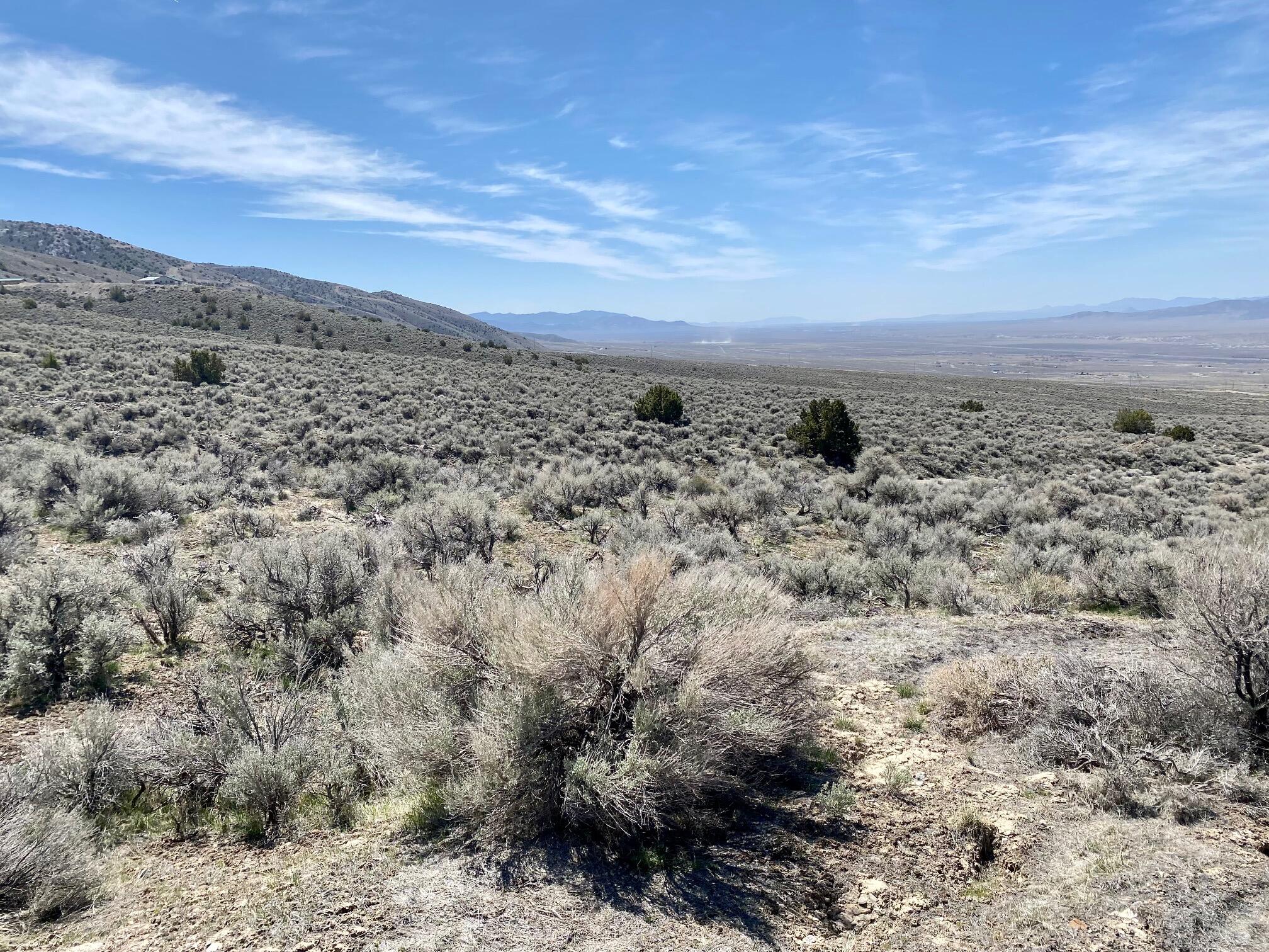 25200 Ramsey Road, Unit 37 Imlay, NV 89418 - Photo 6 of 19 a view of a large building with mountains in the background