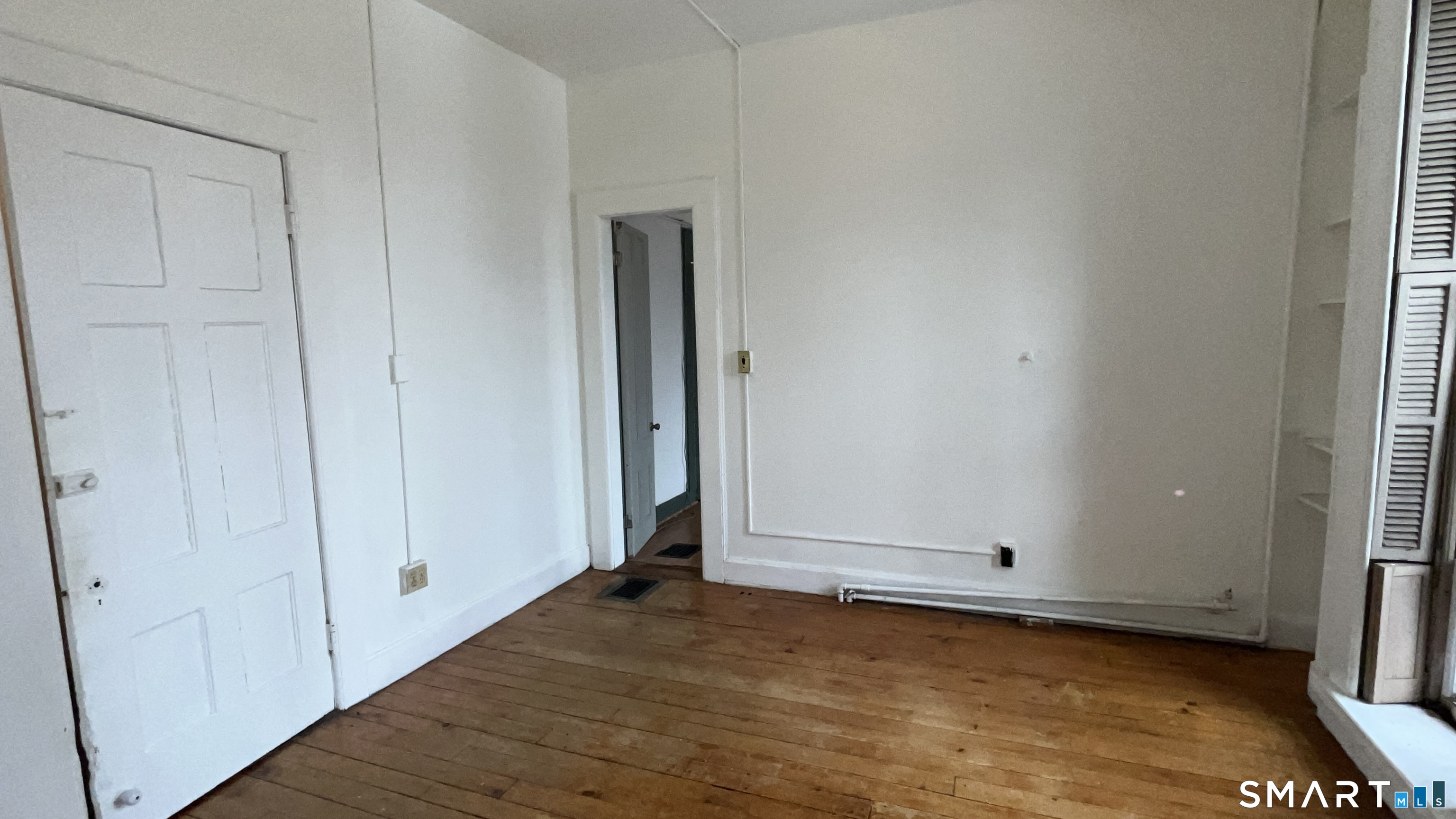 49 Edgewood Way, Unit 5 New Haven, CT 06515 - Photo 9 of 13 a view of a room with wooden floor