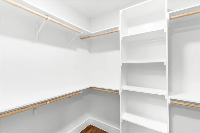 a view of an empty walk in closet