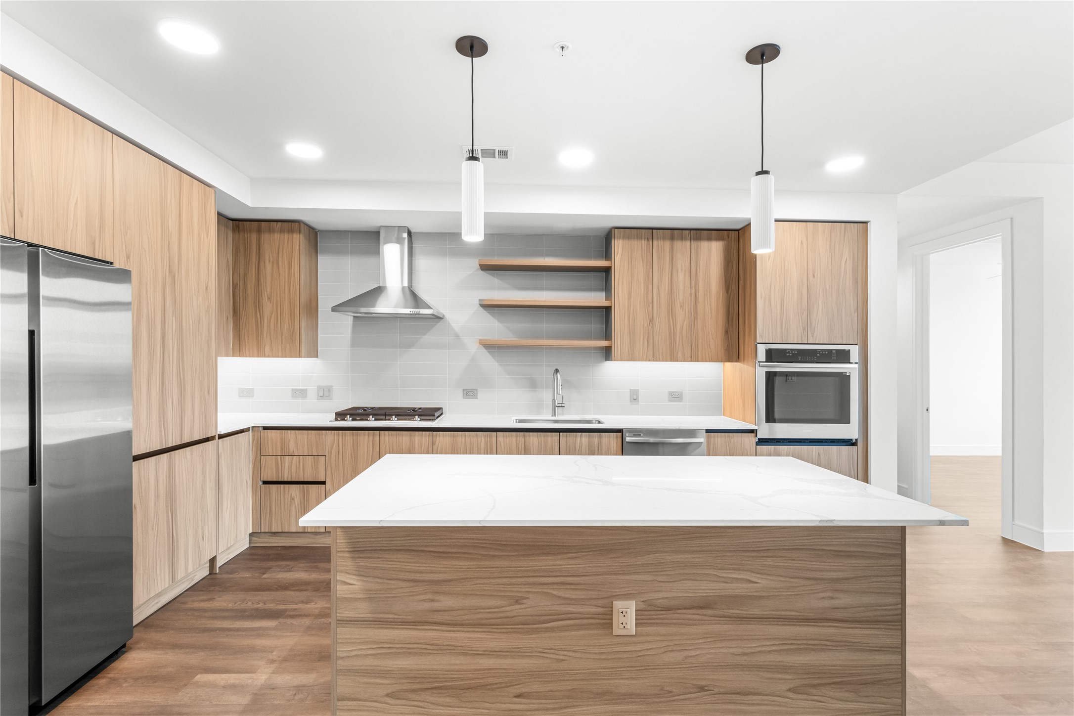 2311 Westheimer Road, Unit 714 Houston, TX 77098 - Photo 7 of 29 a view of kitchen with wooden floor