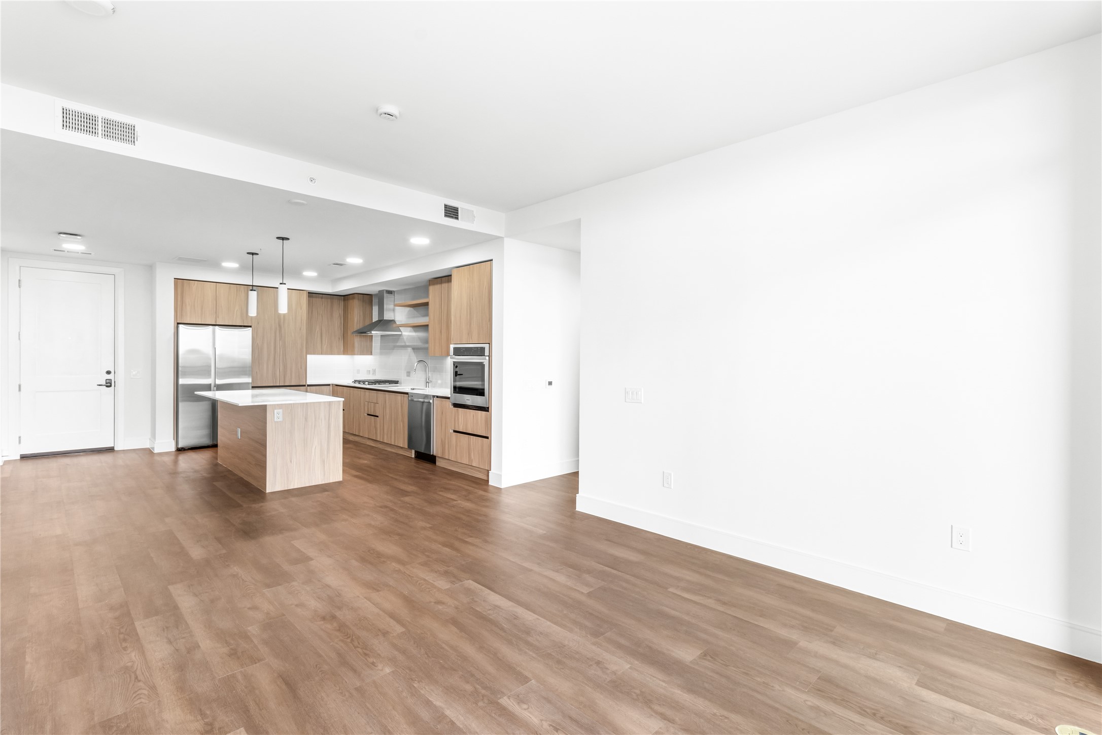 2311 Westheimer Road, Unit 714 Houston, TX 77098 - Photo 8 of 29 a view of kitchen with wooden floor