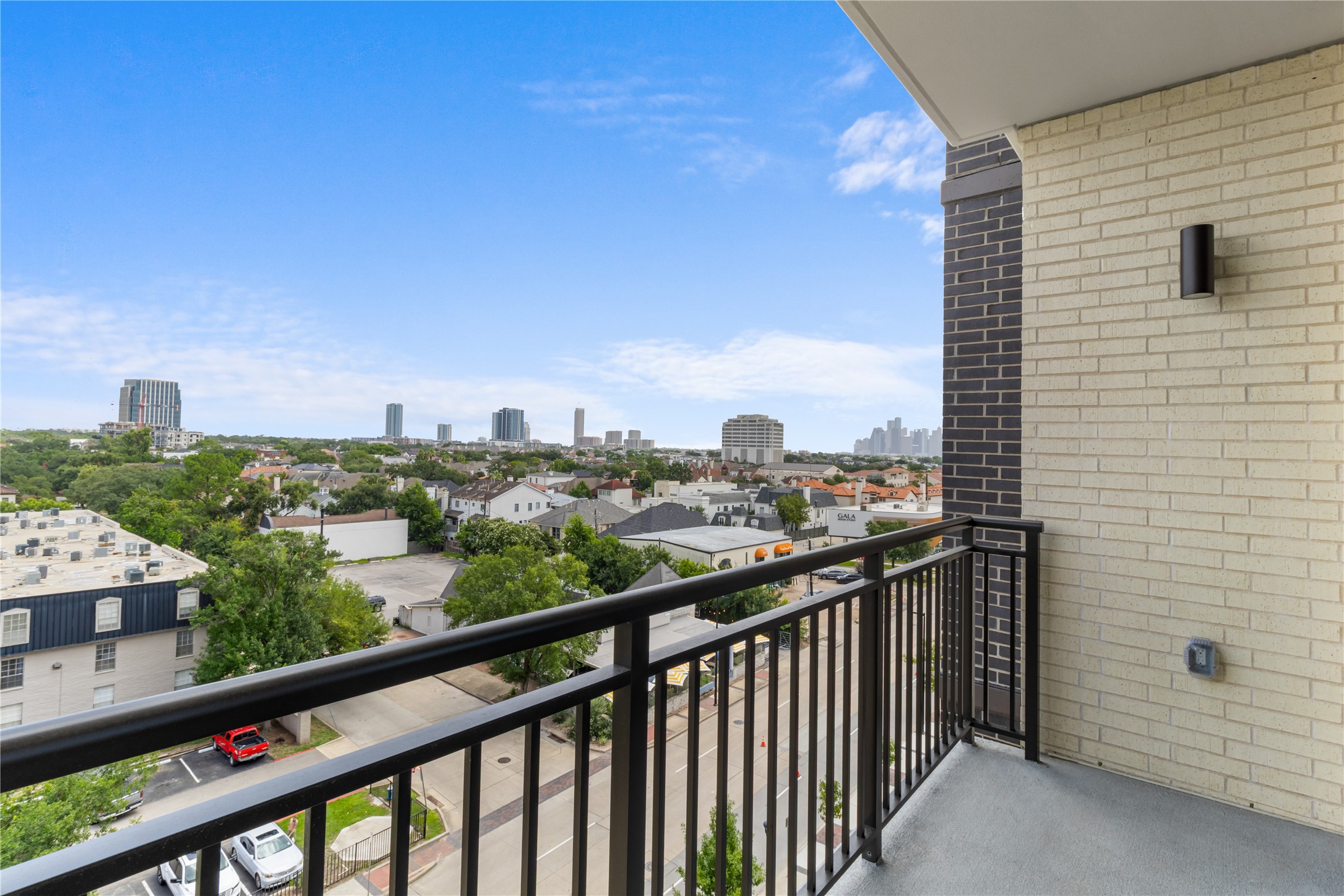 2311 Westheimer Road, Unit 714 Houston, TX 77098 - Photo 9 of 29 a view of a city from a balcony
