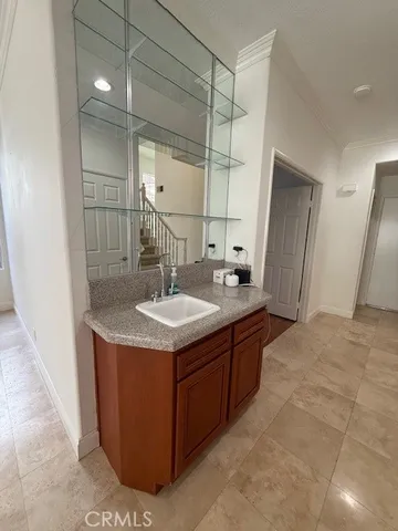 a view of a livingroom with furniture and a fireplace