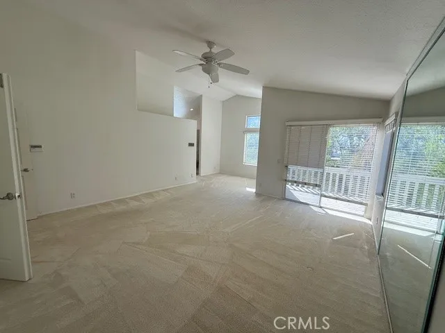 a bathroom with a tub a sink a mirror and a shower