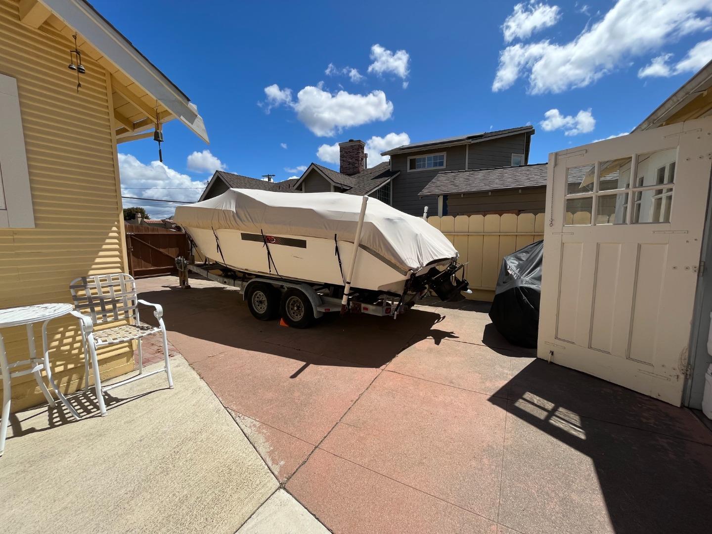 106 Maple Street Salinas, CA 93901 - Photo 21 of 22 a building outdoor space with patio furniture and a chandelier