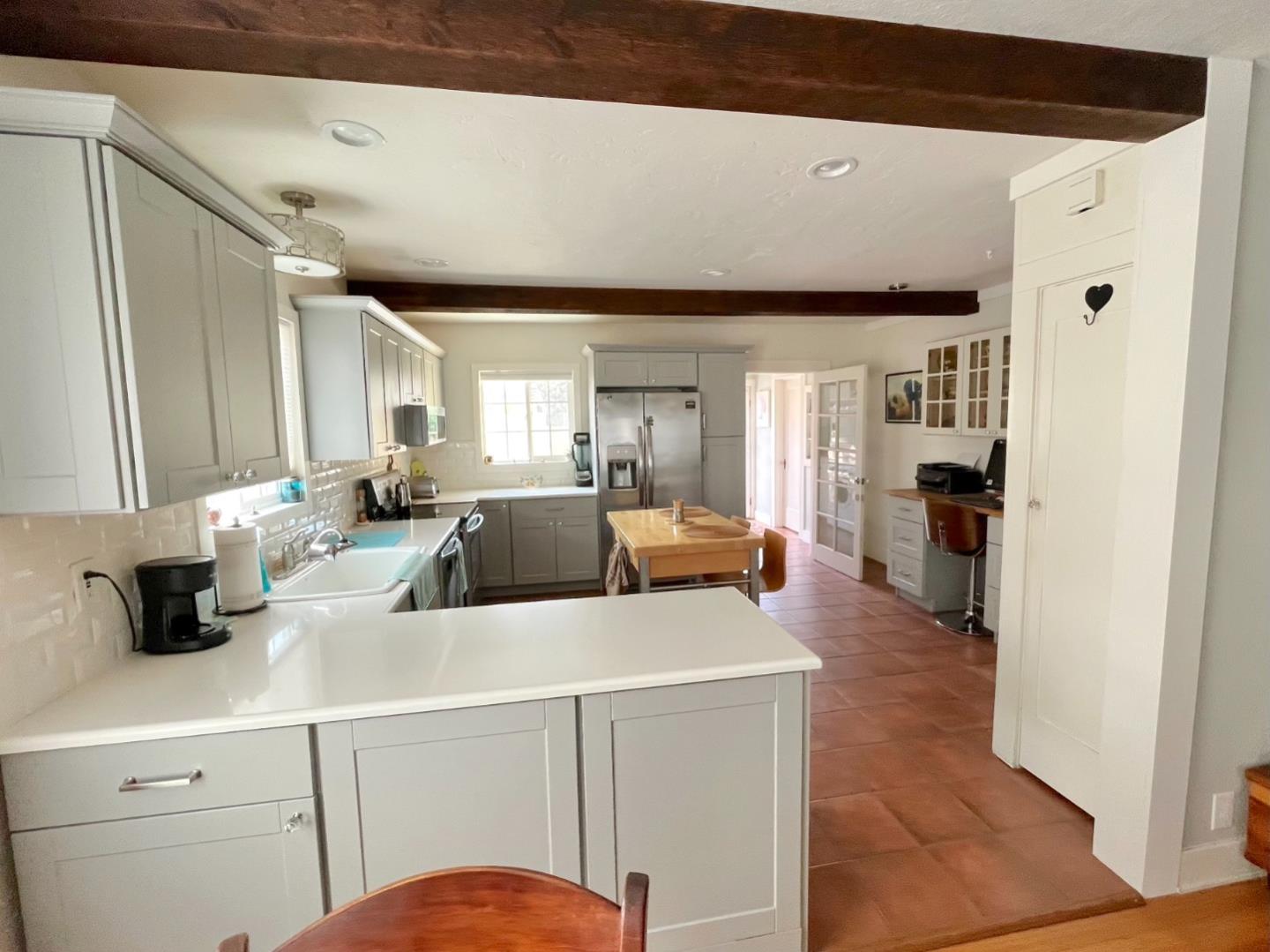 106 Maple Street Salinas, CA 93901 - Photo 9 of 22 a kitchen with a refrigerator and a sink