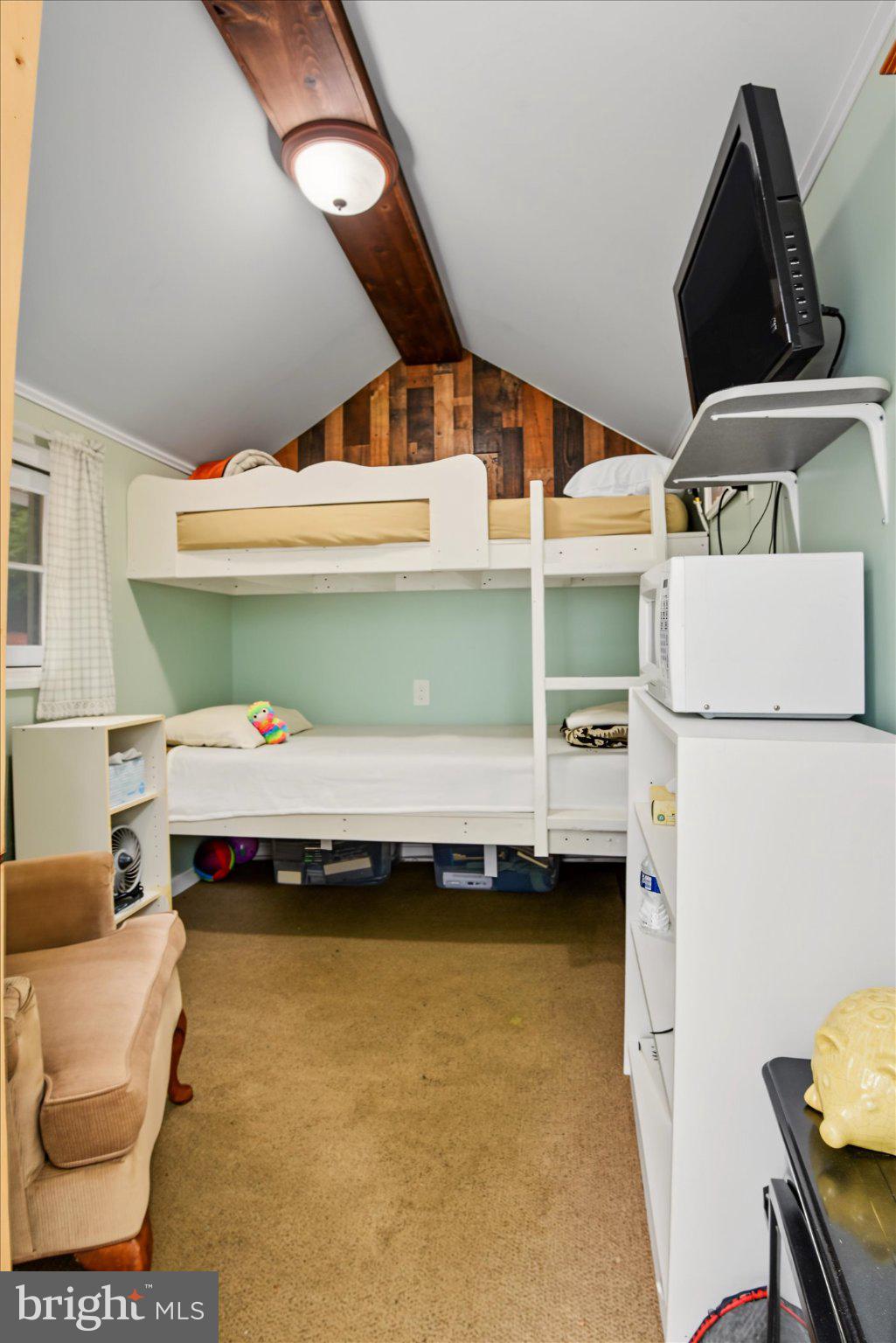 6739 South Clifton Road Frederick, MD 21703 - Photo 40 of 53 Cozy lofted bedroom with rustic charm.