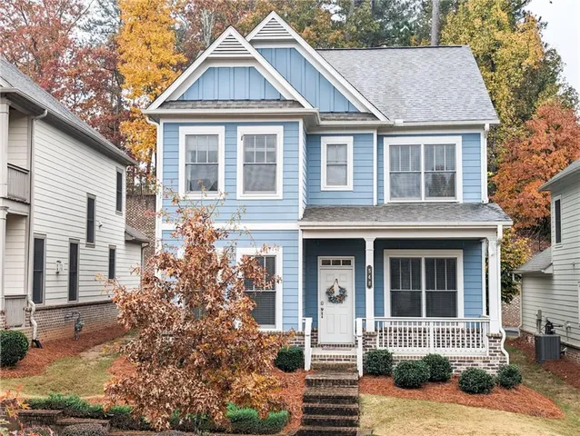 front view of a house with a yard