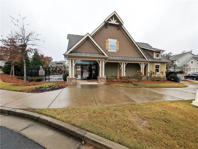 a view of the house with swimming pool