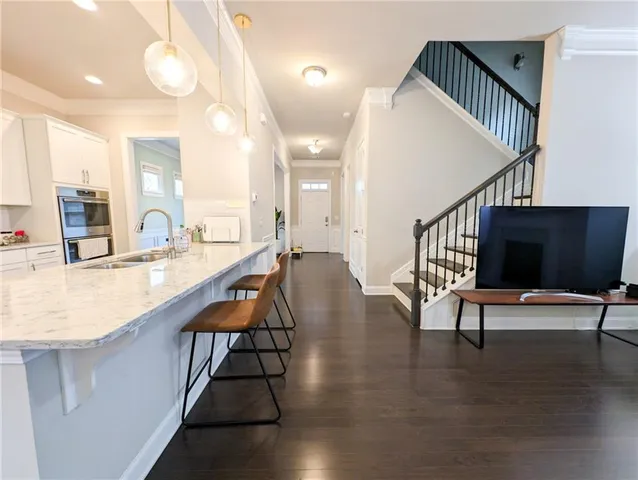 a lobby with furniture and window