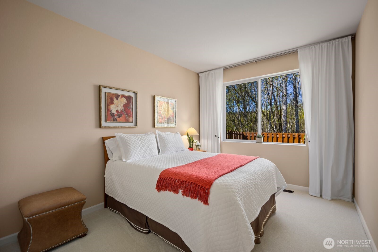 5120 South 214th Way, Unit 10 Kent, WA 98032 - Photo 15 of 39 a bedroom with a bed and a couch