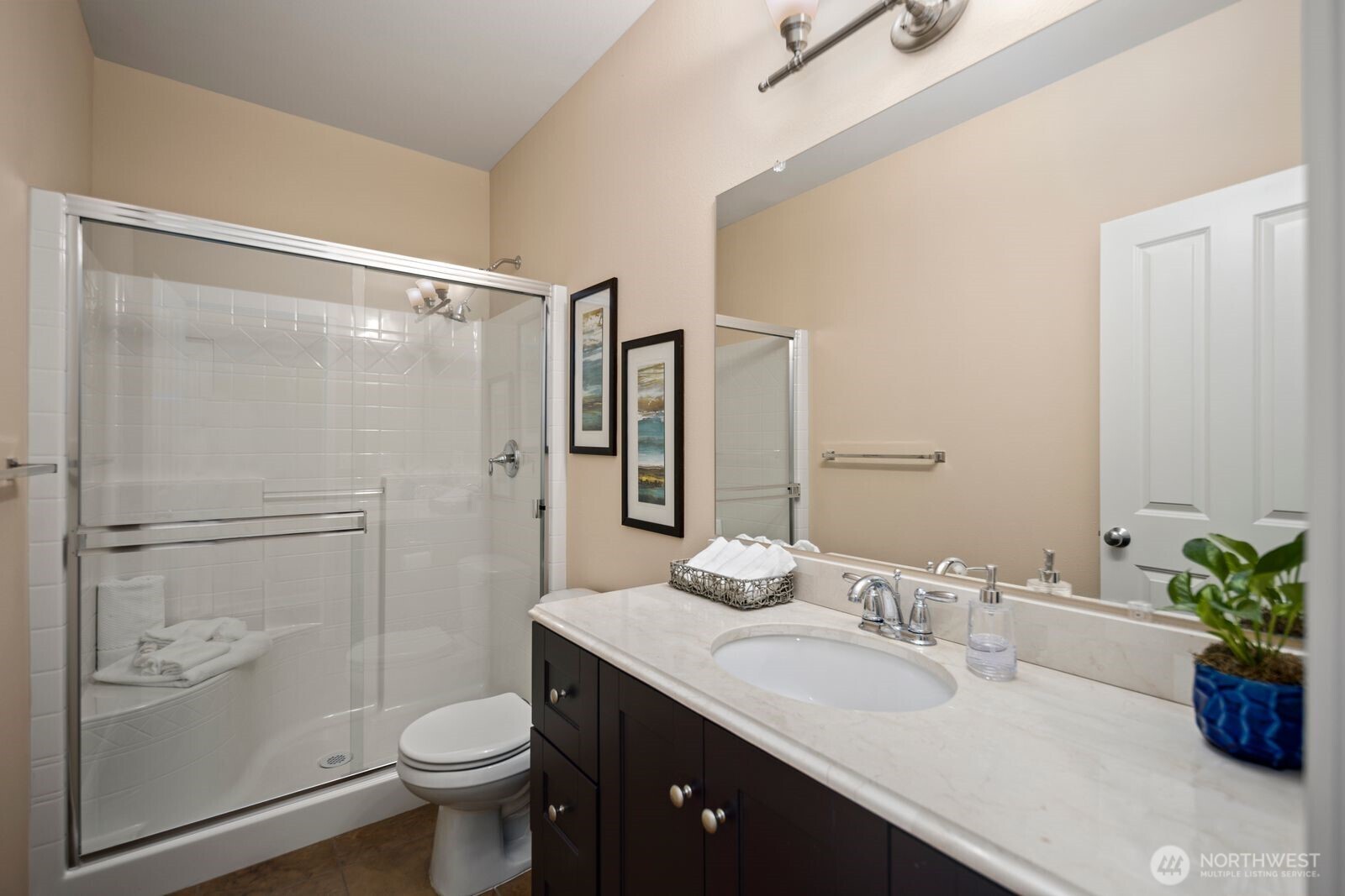 5120 South 214th Way, Unit 10 Kent, WA 98032 - Photo 16 of 39 a bathroom with a granite countertop sink toilet and shower