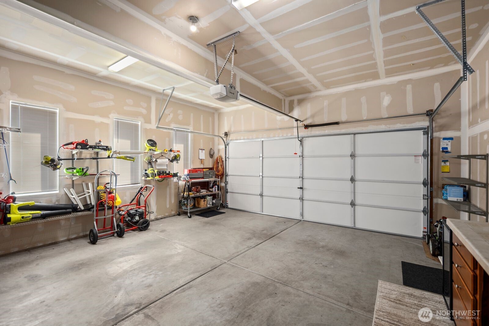5120 South 214th Way, Unit 10 Kent, WA 98032 - Photo 17 of 39 a view of a garage with storage