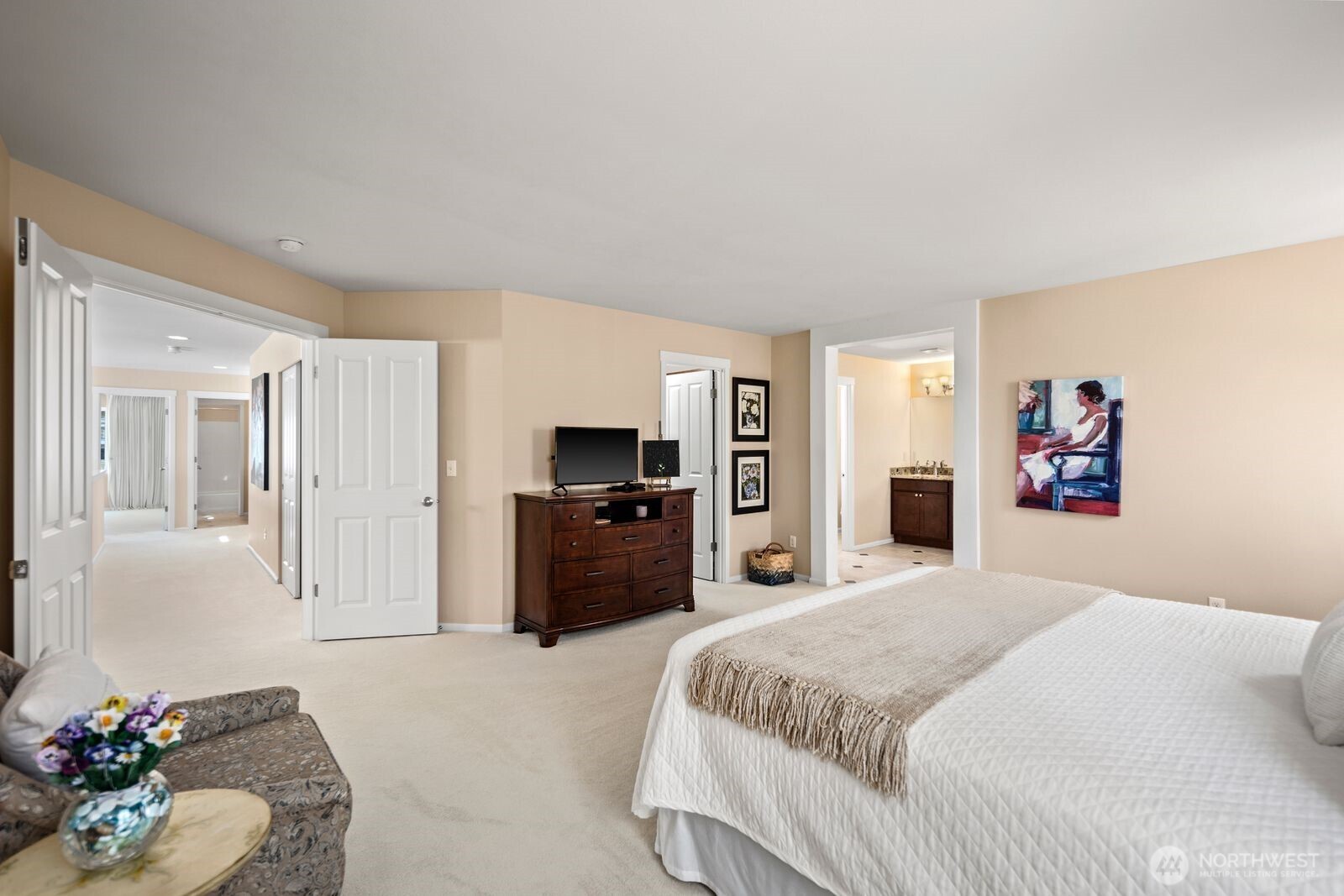 5120 South 214th Way, Unit 10 Kent, WA 98032 - Photo 23 of 39 a bedroom with a bed and dresser