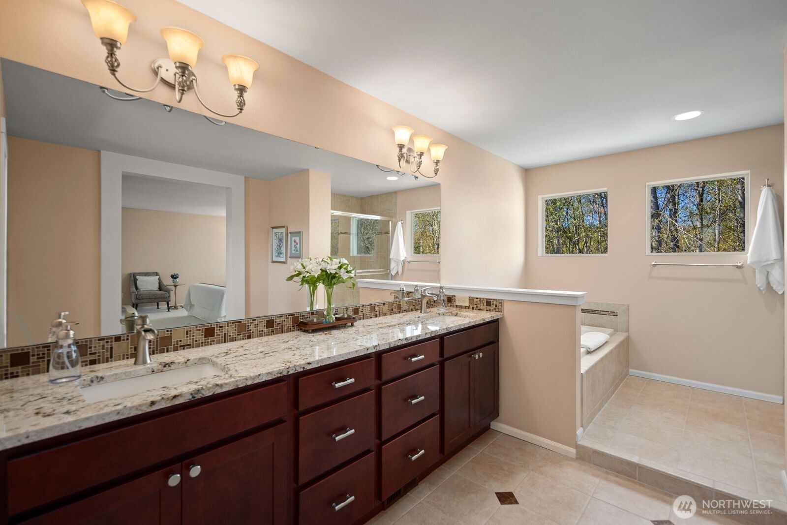 5120 South 214th Way, Unit 10 Kent, WA 98032 - Photo 27 of 39 a bathroom with a granite countertop double vanity sink and a mirror