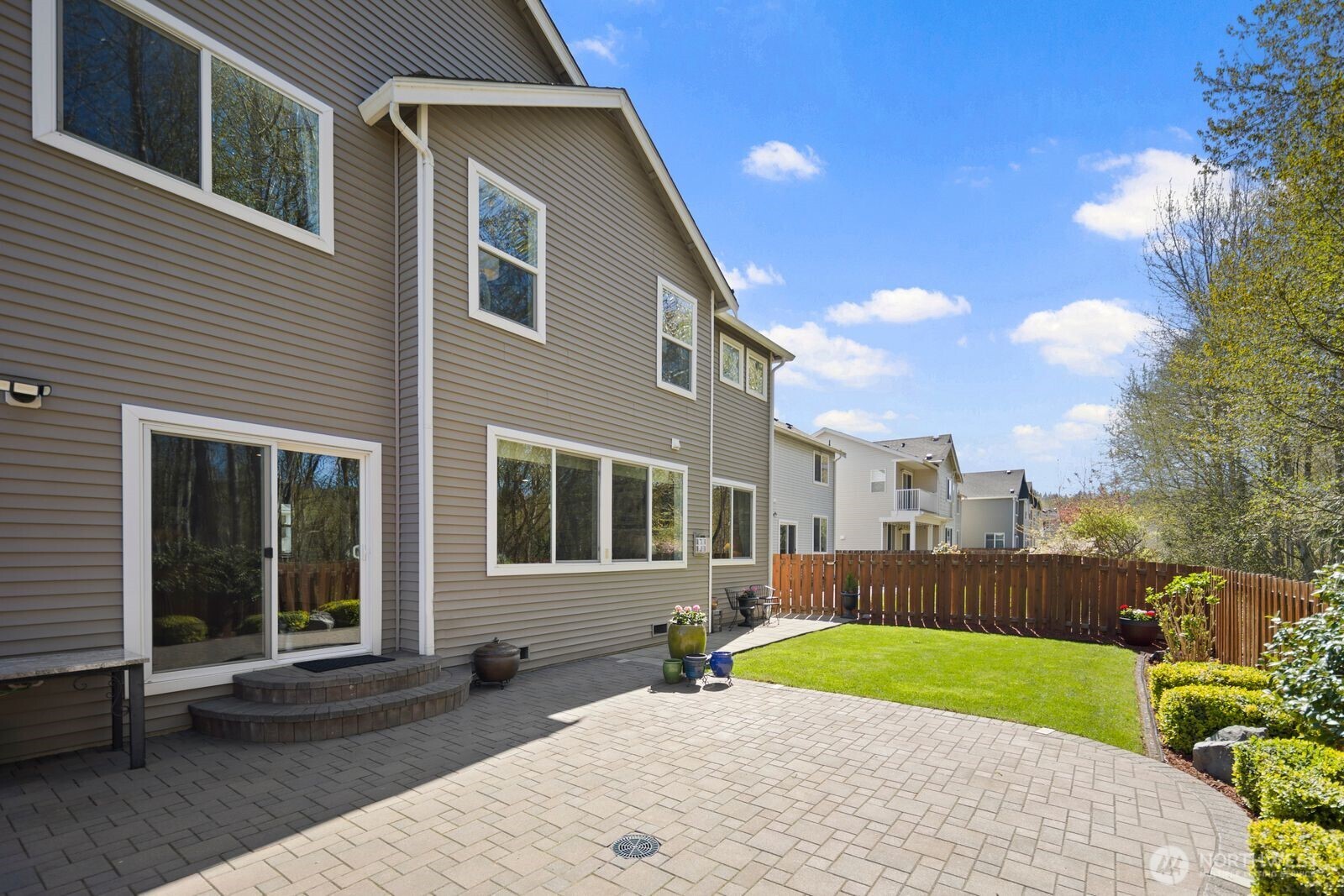 5120 South 214th Way, Unit 10 Kent, WA 98032 - Photo 32 of 39 a house view with a garden space