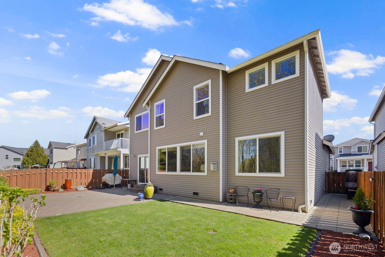 5120 South 214th Way, Unit 10 Kent, WA 98032 - Photo 33 of 39 a front view of house with yard and outdoor seating