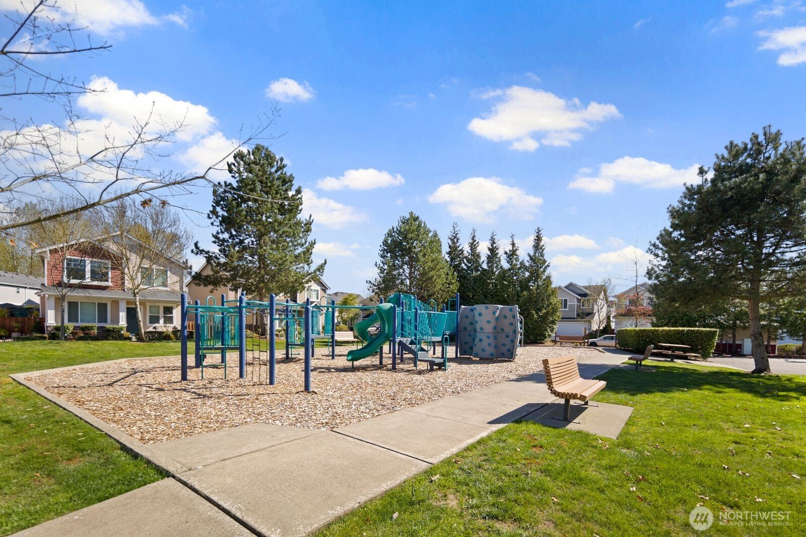 5120 South 214th Way, Unit 10 Kent, WA 98032 - Photo 37 of 39 a view of a park with many houses