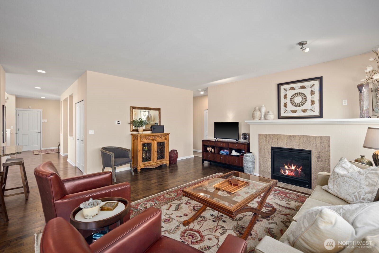 5120 South 214th Way, Unit 10 Kent, WA 98032 - Photo 7 of 39 a living room with furniture and a fireplace