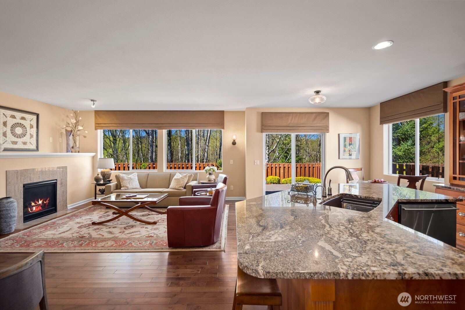 5120 South 214th Way, Unit 10 Kent, WA 98032 - Photo 10 of 39 a living room with fireplace furniture and a large window