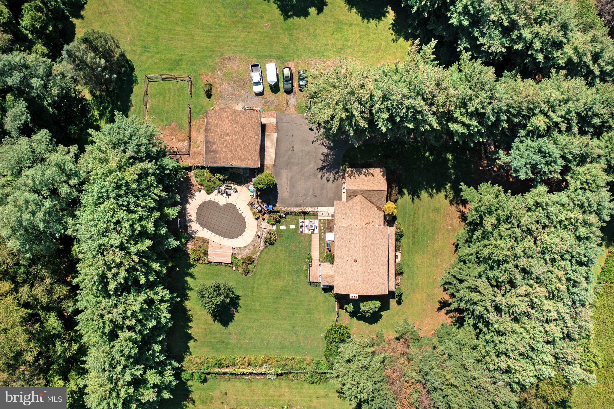 87 Bordentown Chesterfield Road Chesterfield, NJ 08515 - Photo 39 of 49 an aerial view of a house with a yard and garden