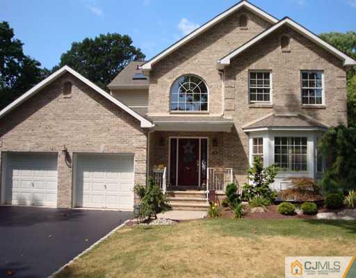 27 Hillsdale Road Edison, NJ 08820 - Photo 1 of 10 a front view of a house with a yard