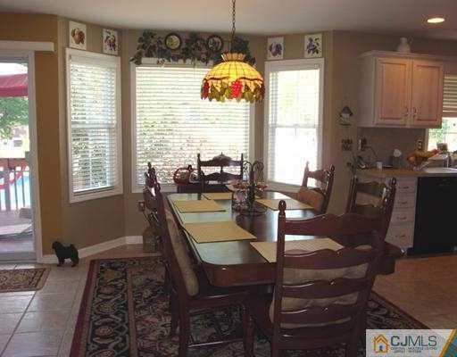 27 Hillsdale Road Edison, NJ 08820 - Photo 5 of 10 a dining room with furniture and window