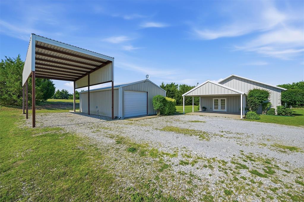 15656 South State Highway 78 Blue Ridge, TX 75424 - Photo 8 of 36 a front view of house with yard