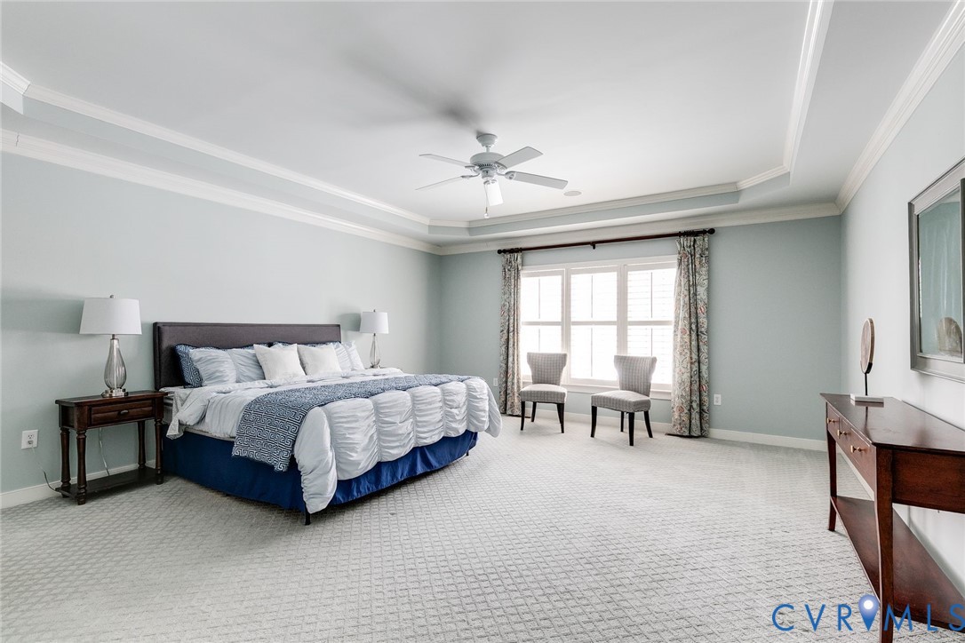 507 Hunt Field Road Manakin-Sabot, VA 23103 - Photo 24 of 43 a spacious bedroom with a bed and a window