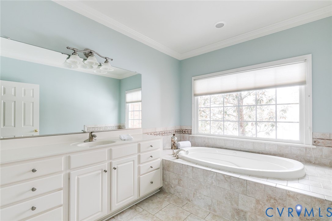 507 Hunt Field Road Manakin-Sabot, VA 23103 - Photo 26 of 43 a spacious bathroom with sinks mirror and a bathtub