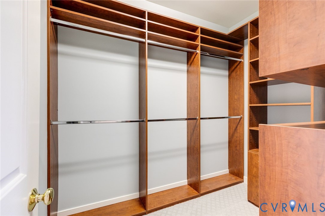 507 Hunt Field Road Manakin-Sabot, VA 23103 - Photo 28 of 43 a view of walk in closet with empty racks