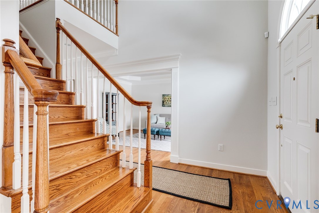 507 Hunt Field Road Manakin-Sabot, VA 23103 - Photo 3 of 43 a view of staircase with wooden floor and white walls